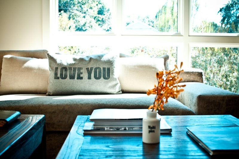 beach style family room by Cortney Bishop Design